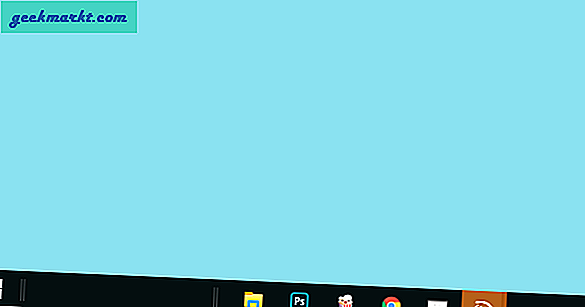 Slik sentrerer du oppgavelinjeikoner i Windows 10